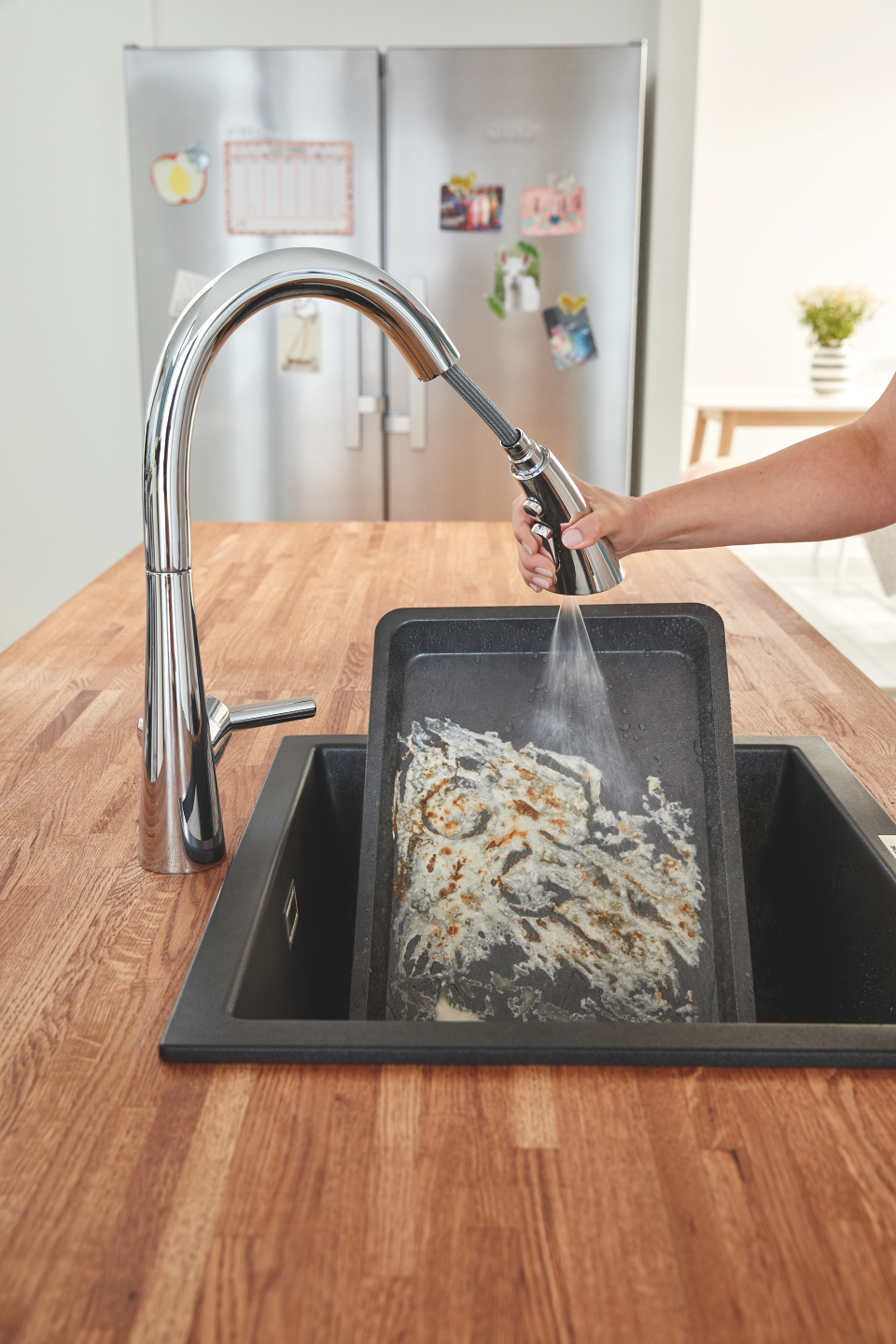 GROHE Zedra keukenkraan in chroom met uittrekbare sproeier om makkelijk de afwas mee te doen