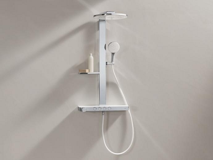 Rainshower Aqua Pure shower system mounted on a light gray wall, featuring the round shower head design.