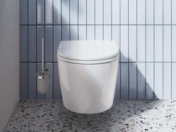 A close-up to a wall-mounted white toilet in a modern bathroom.