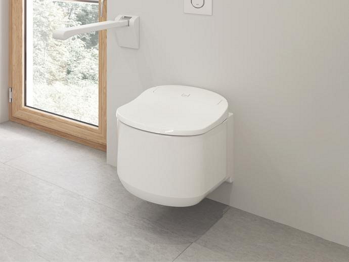 GROHE Sensia Arena shower toilet attached to a wall.