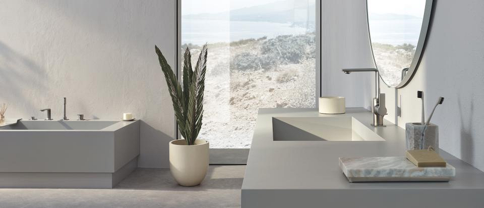 GROHE Satin Steel in steel grey on beige and cream-toned materials – clean lines and a minimalist, tactile aesthetic.