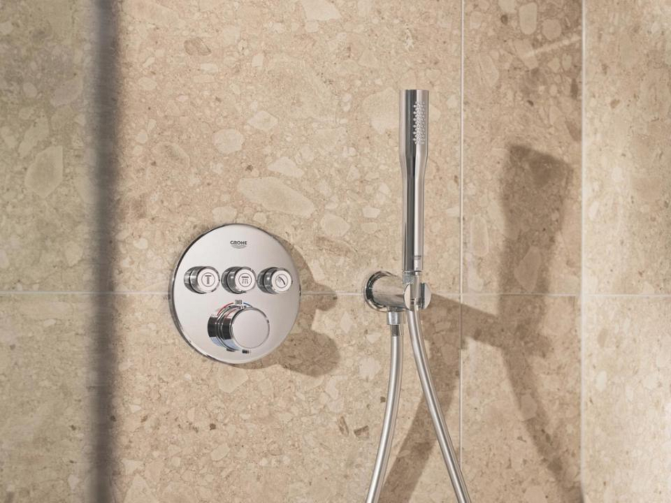 Inbouwdouche met rond bedieningspaneel en stick